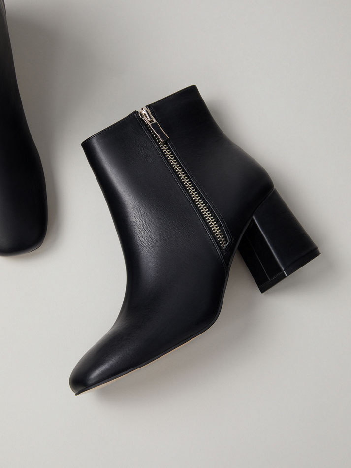 cream heeled ankle boots