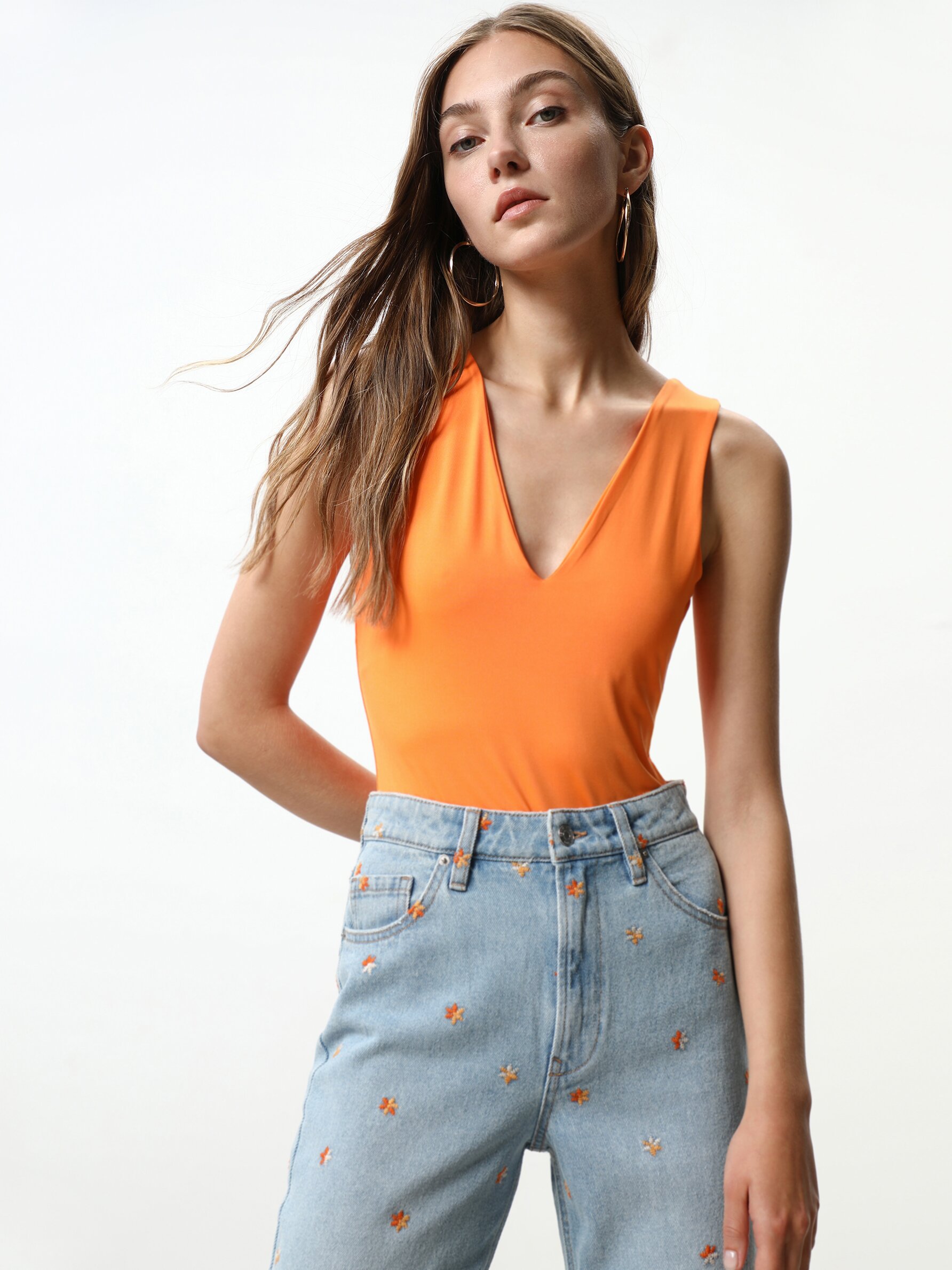 orange v neck bodysuit