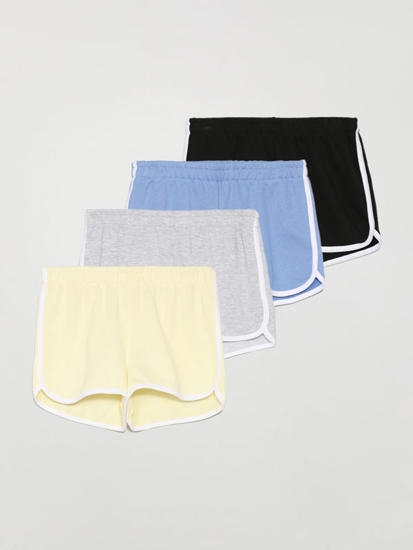Pack of 4 pairs of basic plush shorts with piping