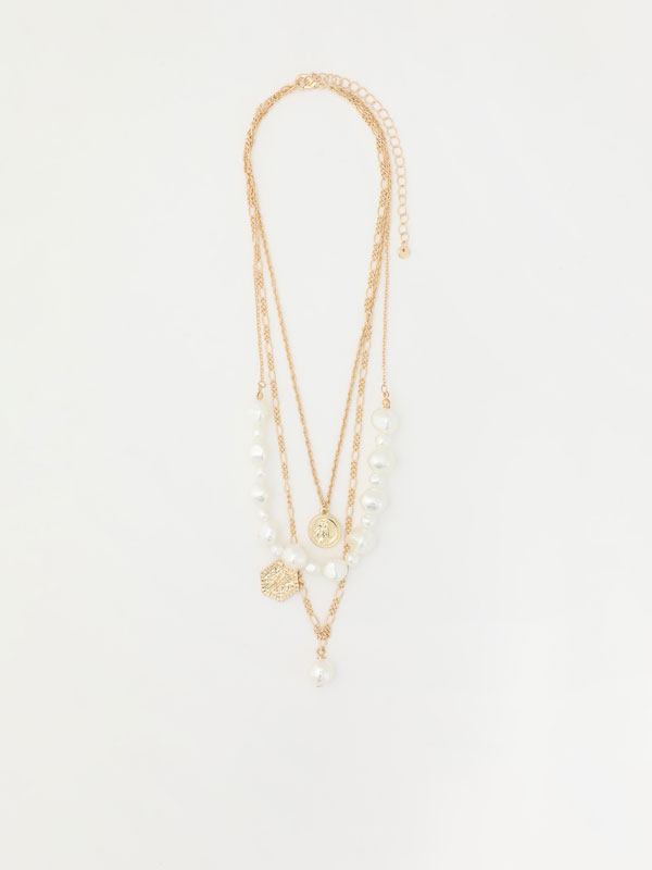 Multi-strand necklace with faux pearls