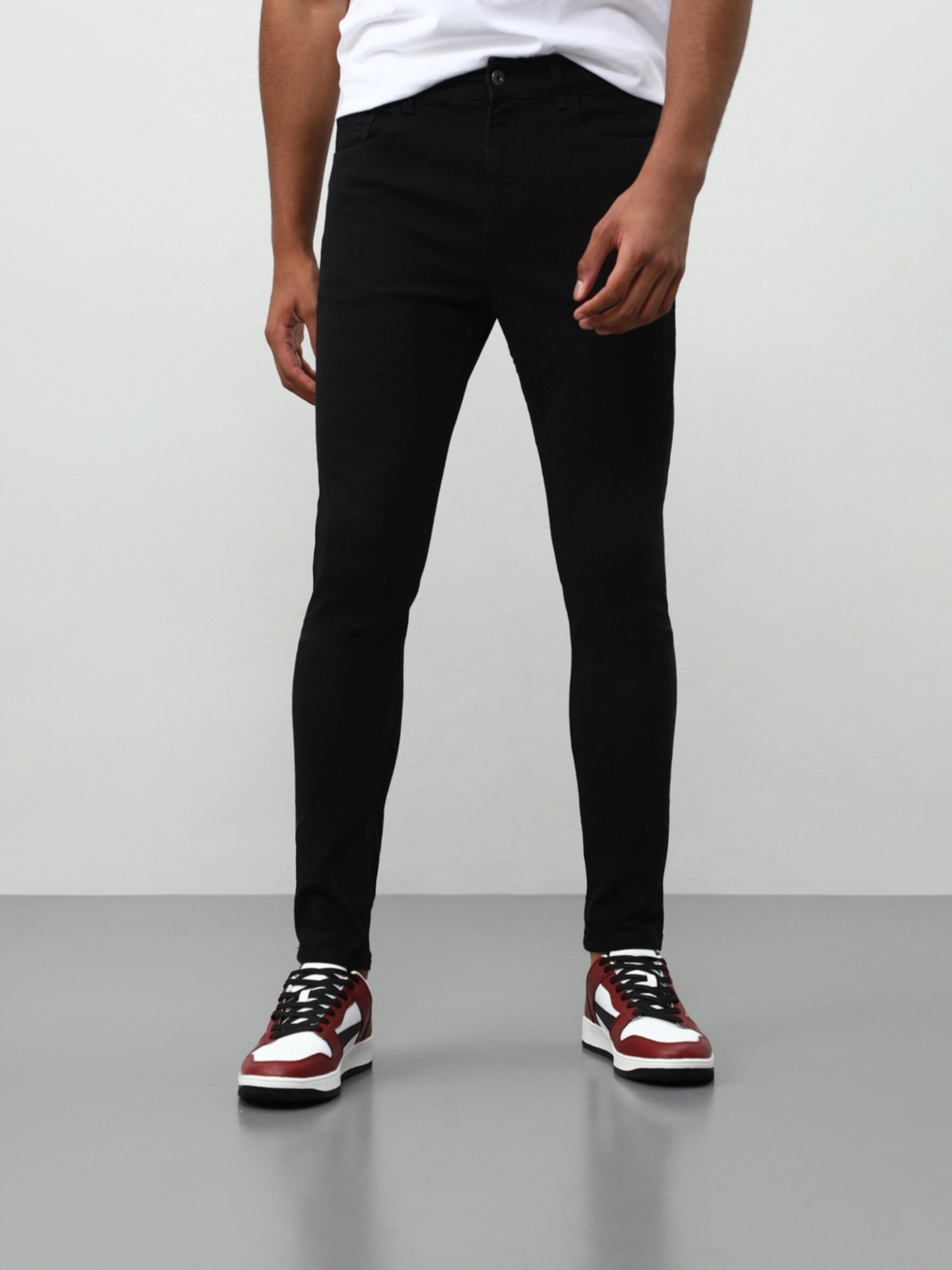 grey spray on skinny jeans