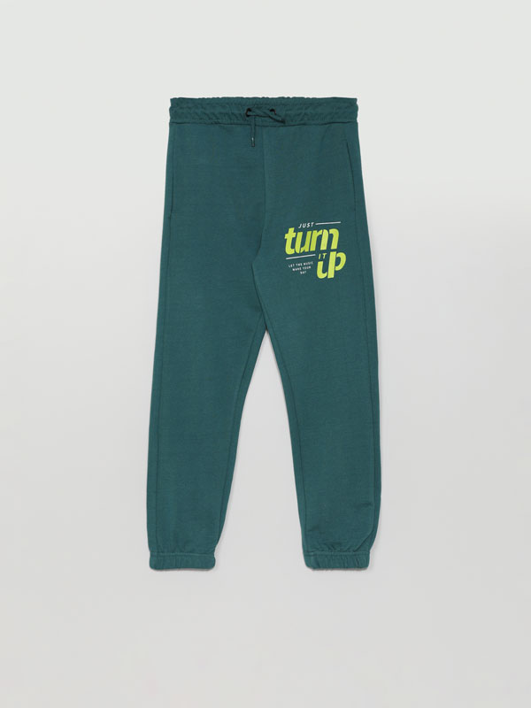 Plush trousers with slogan