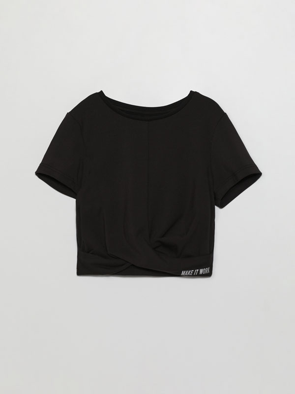 Soft-touch cropped draped sports top