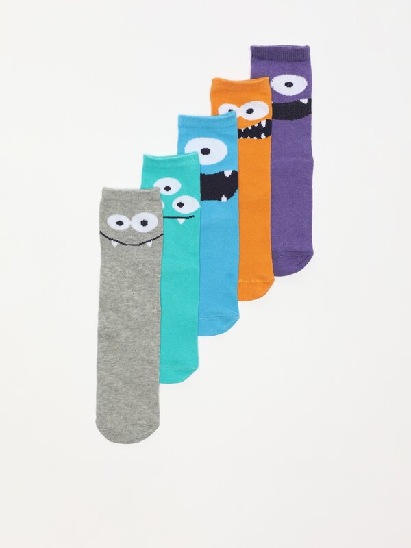 Pack of 5 pairs of long socks with a monster print.