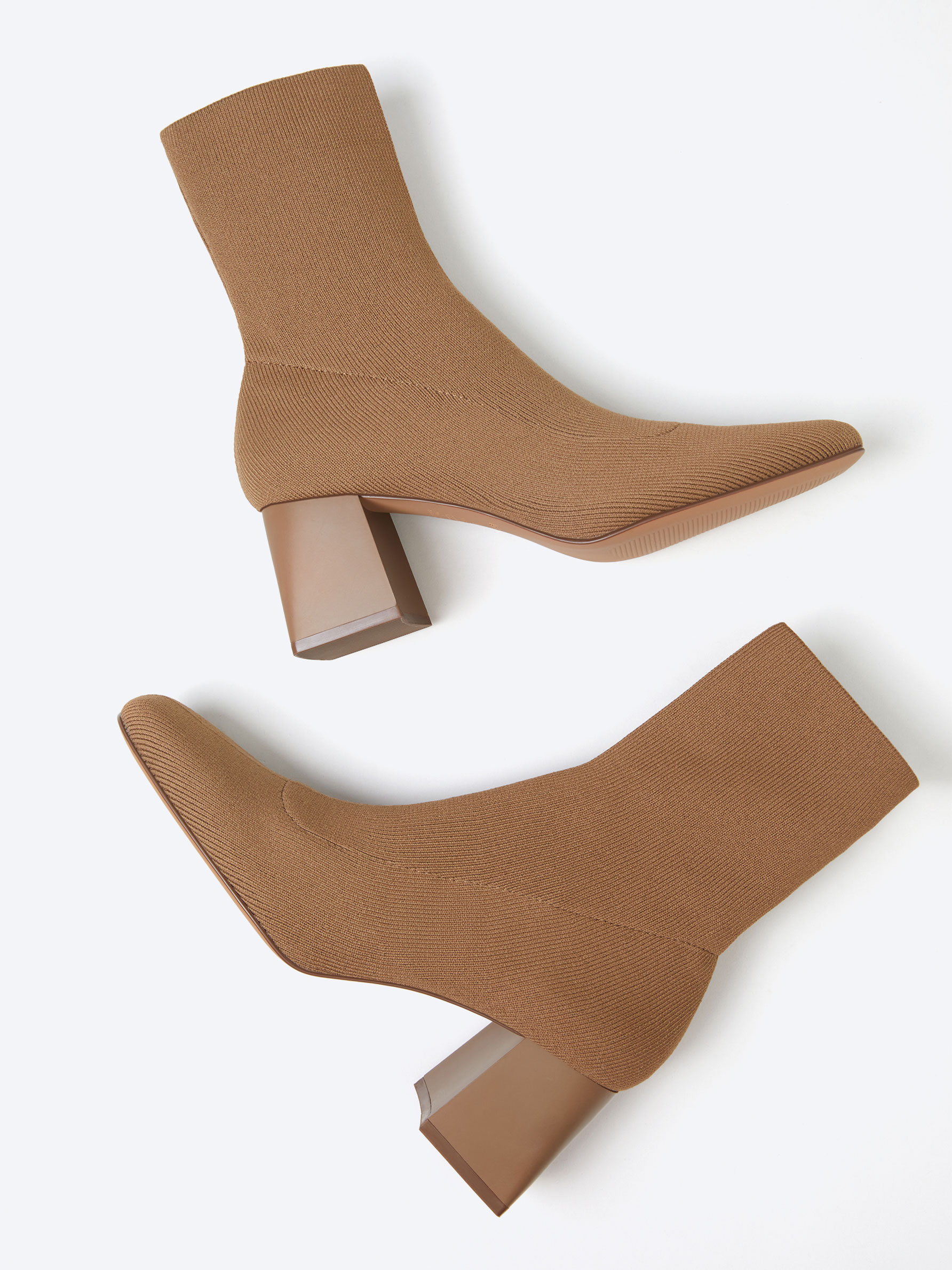 sock style heeled ankle boots