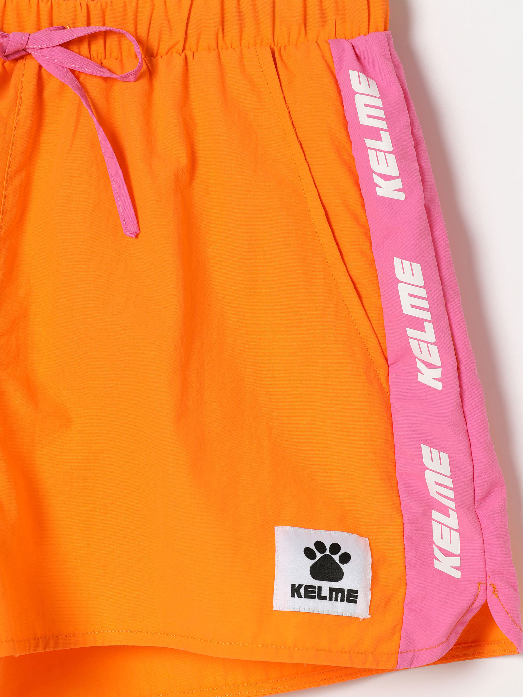 orange nylon shorts