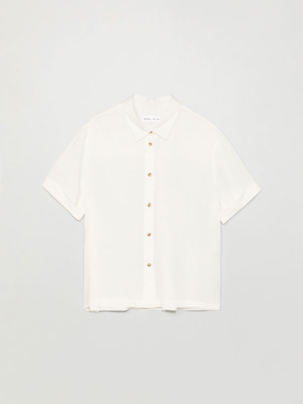 camisa blanca corta