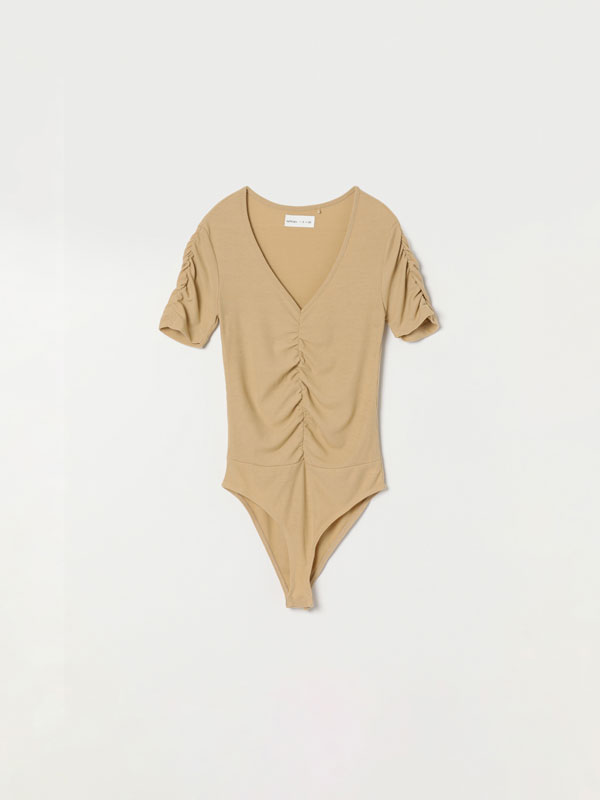 Bodysuit with short gathered sleeves