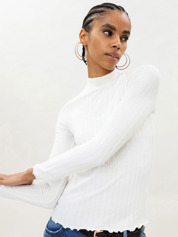 white long sleeve roll neck top