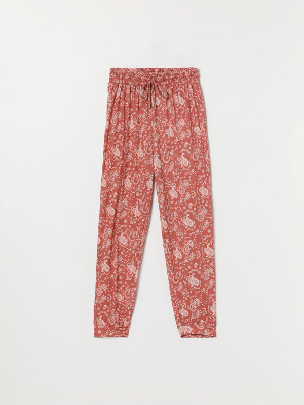 Flowing printed trousers with ties