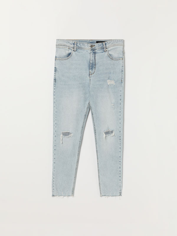 Frayed skinny carrot fit jeans
