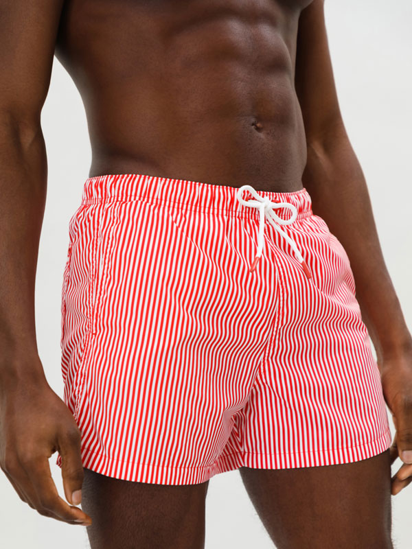 Striped print swimming trunks