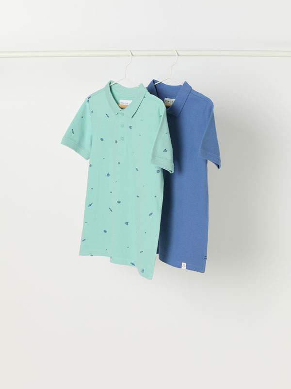 2-pack of assorted plain and printed polo shirts