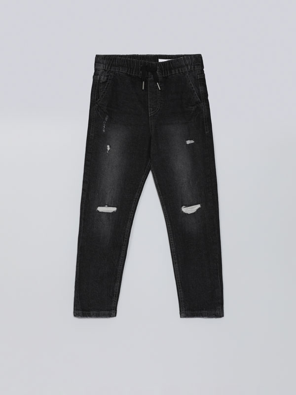 Jeans Comfort Jogger elástico con rotos
