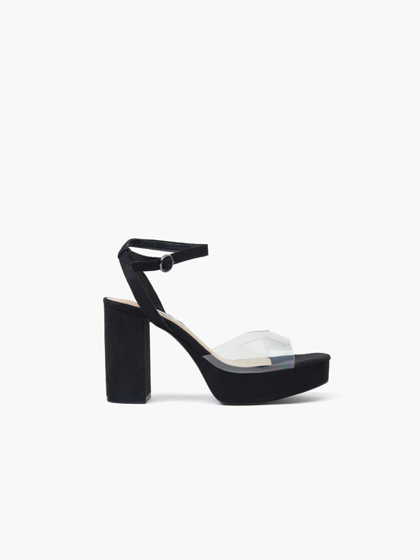 Heeled sandals with vinyl detail