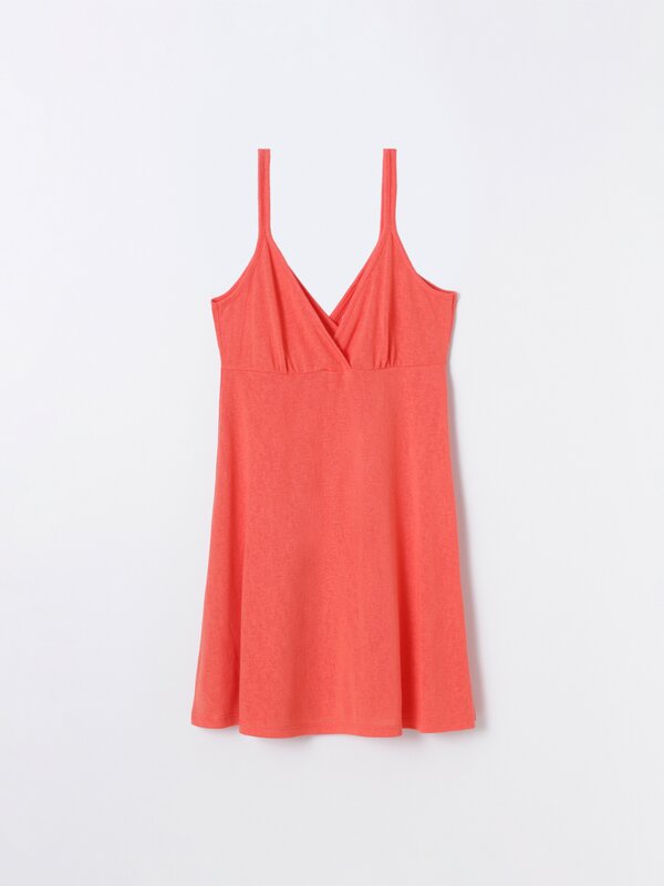 Strappy dress with a crossover neckline