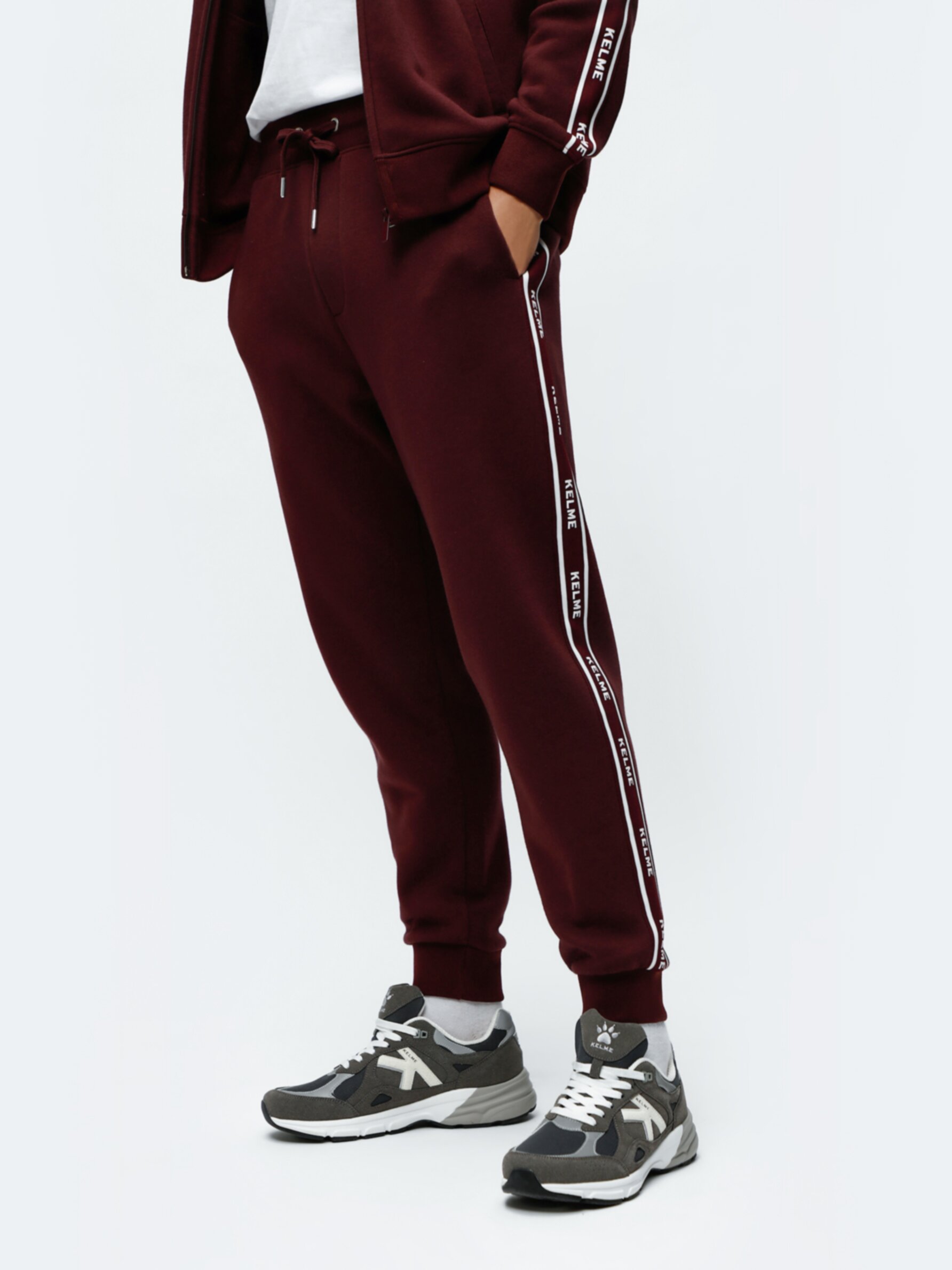 Kelme x Lefties trousers with side stripes