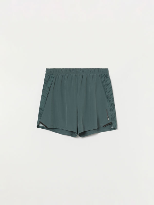 Sports shorts with side stripes
