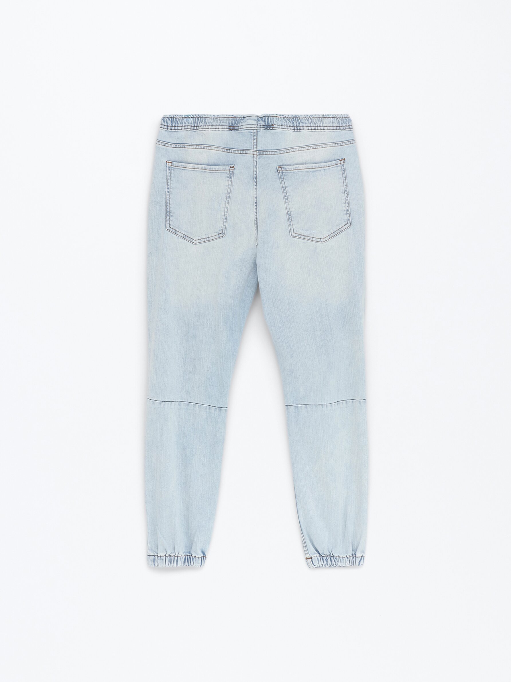 Ripped jogger jeans Joggers Trousers CLOTHING Man