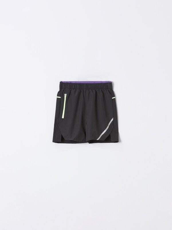 Sporty Bermuda shorts with zips