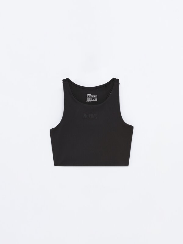 Sports top with rubberised slogan
