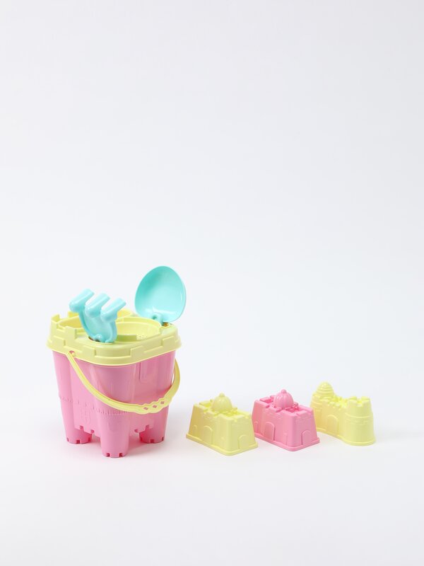 Set of beach bucket, shapes and castle spade