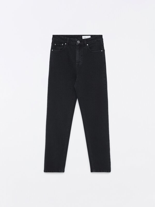 Mom jeans with rips and shiny details