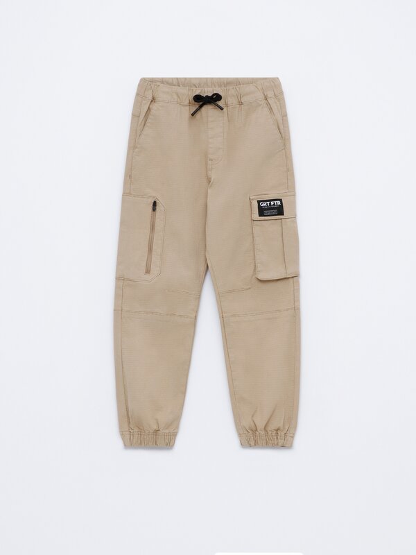 Parachute trousers with pockets