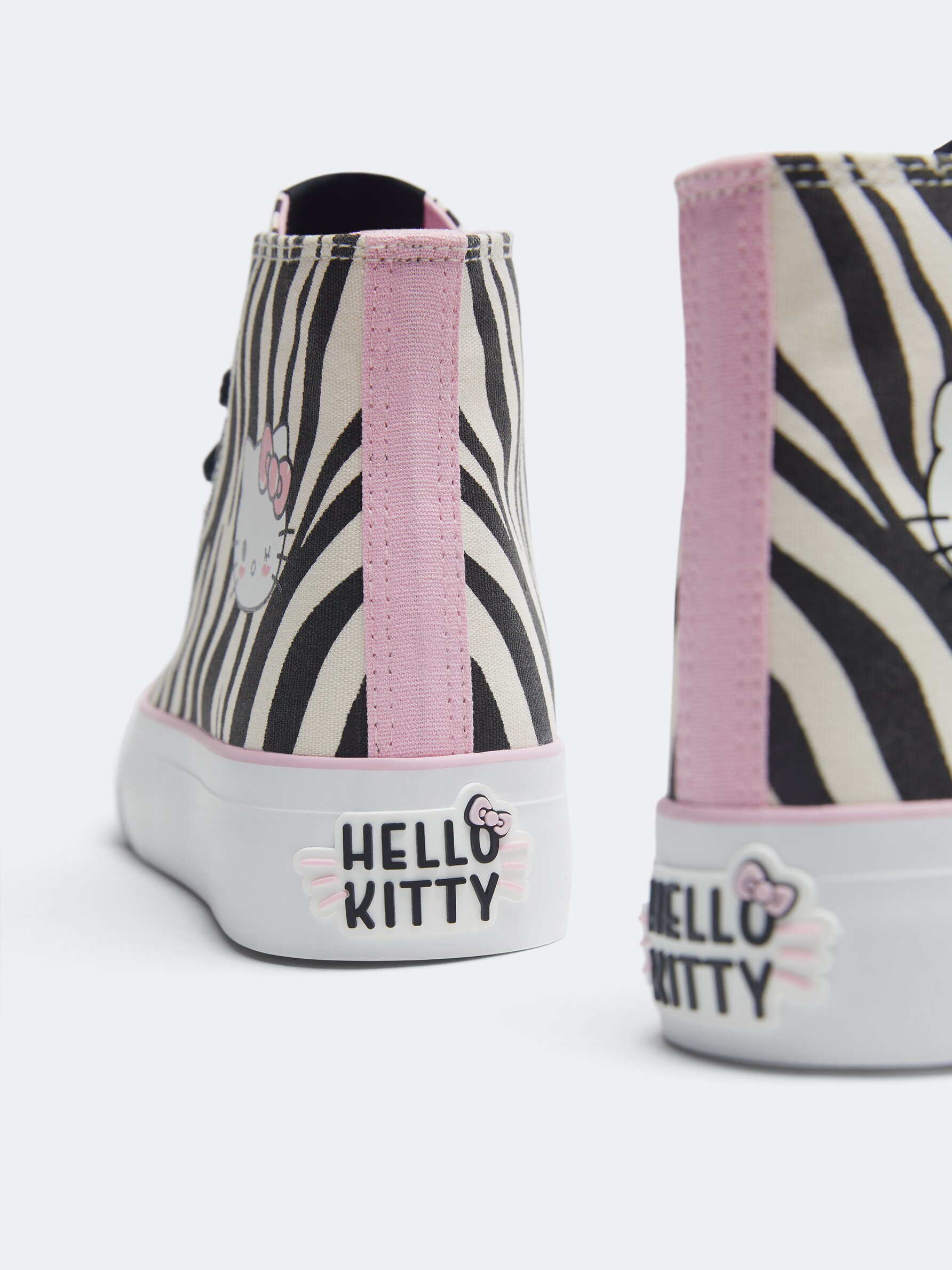 Hello kitty high top converse sales