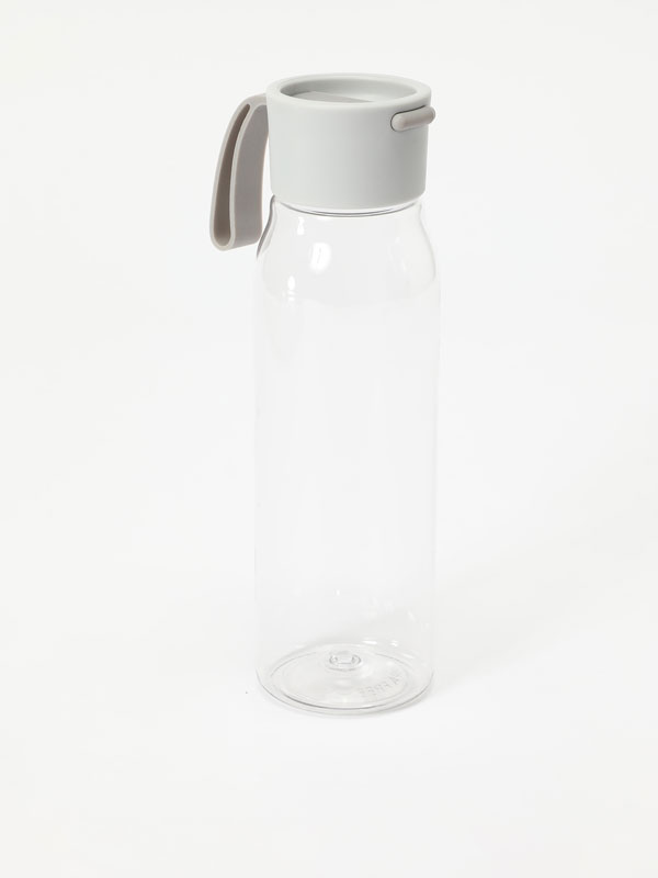 Bottle with cap and strap