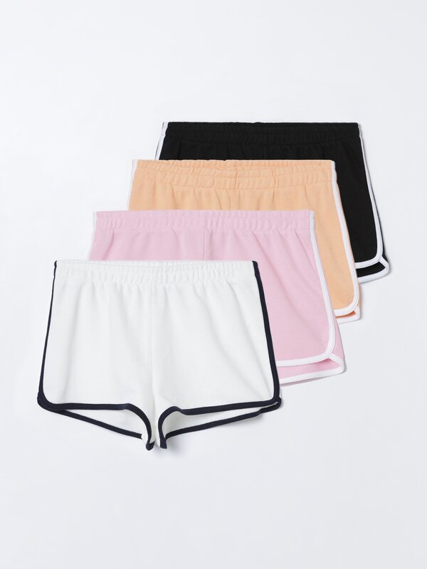 Pack of 4 pairs of basic plush shorts with piping
