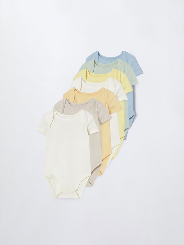 7-Pack of plain-coloured coloured bodysuits