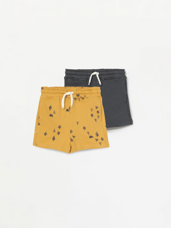 2-pack of plain and printed plush shorts