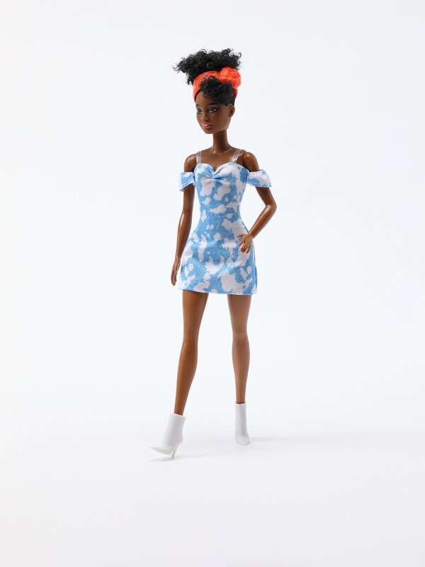 Barbie™ fashonista pelo rizado