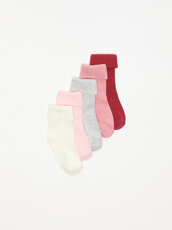 Pack de 5 pares de meias compridas enroladas com canelado.