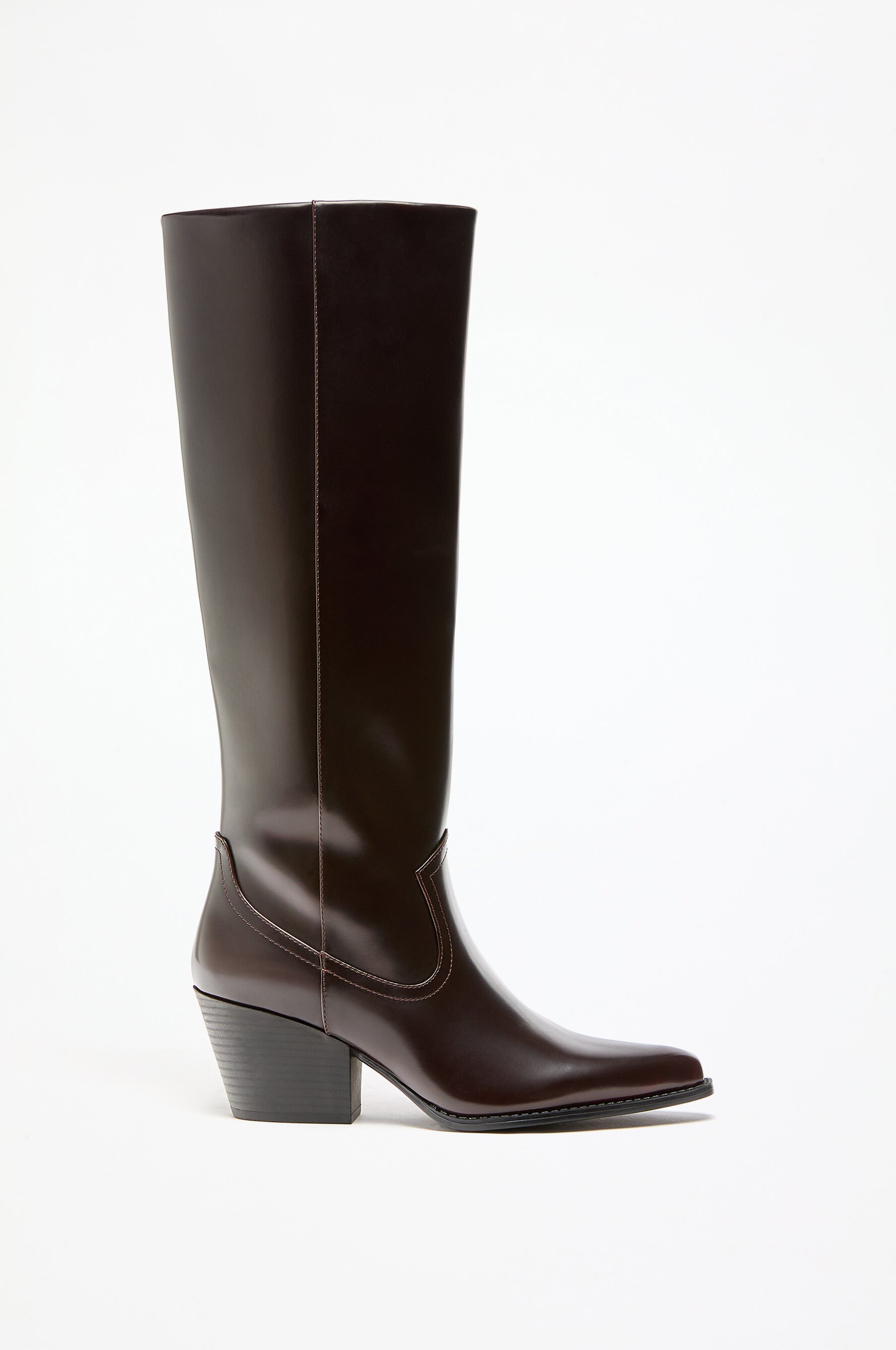 Knee high boots in store shop