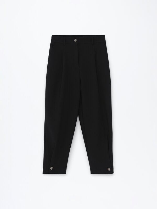 Pantalon negro roto online de las rodillas hombre