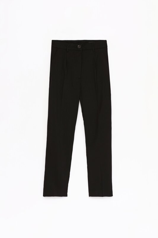 Pantalon negro roto discount de las rodillas hombre