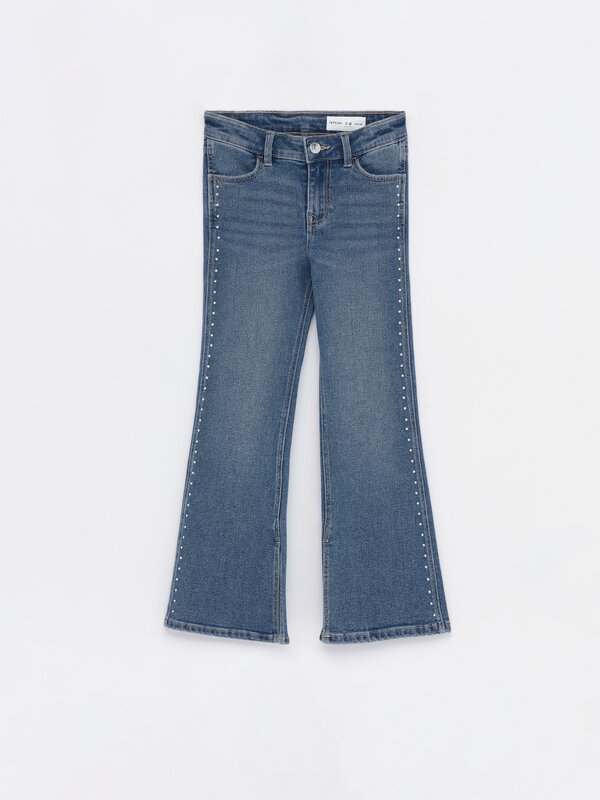 Flared jeans with studs
