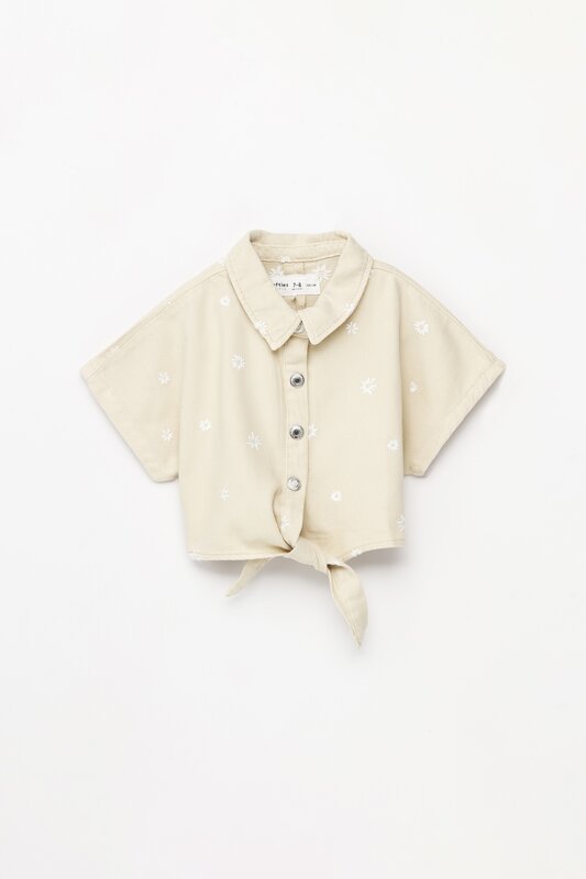 Knotted shirt with embroidery