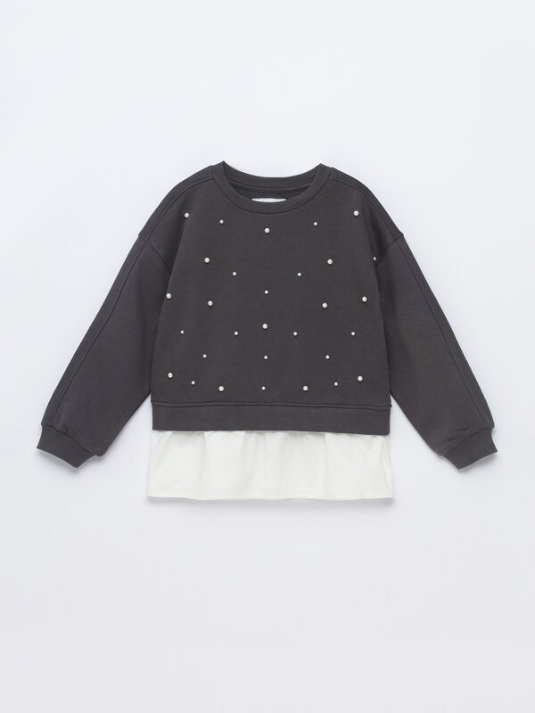 Sweatshirt with faux pearls and shirt hem
