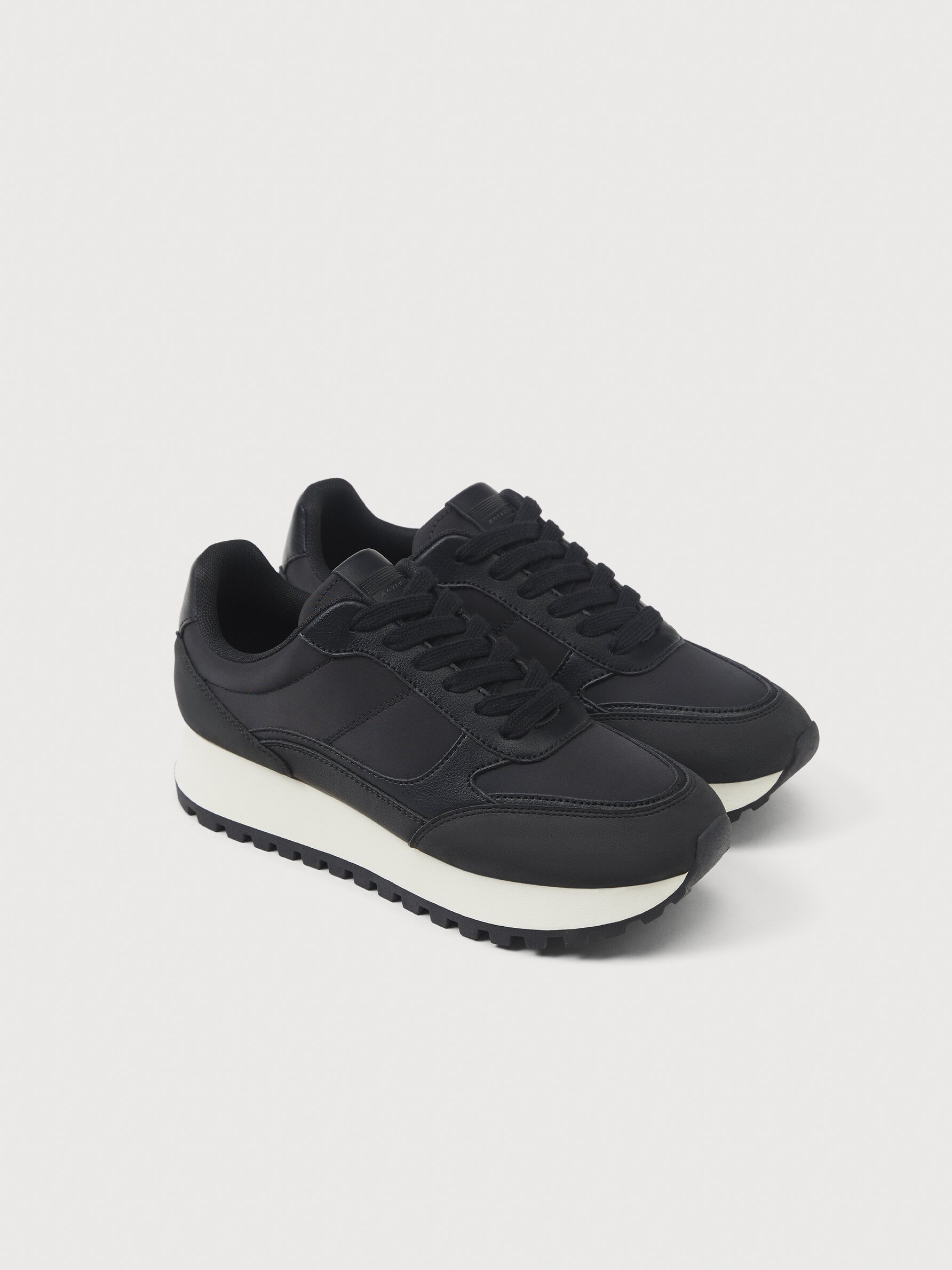 Black leather sneakers with black soles deals