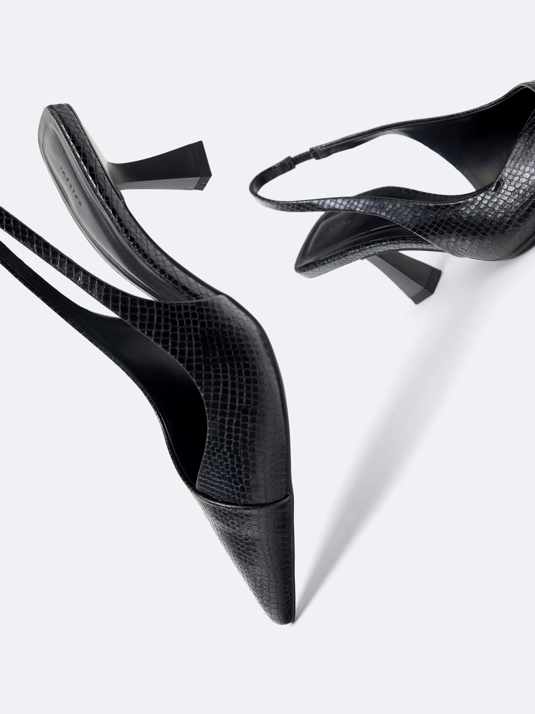 Snakeskin high heels shop