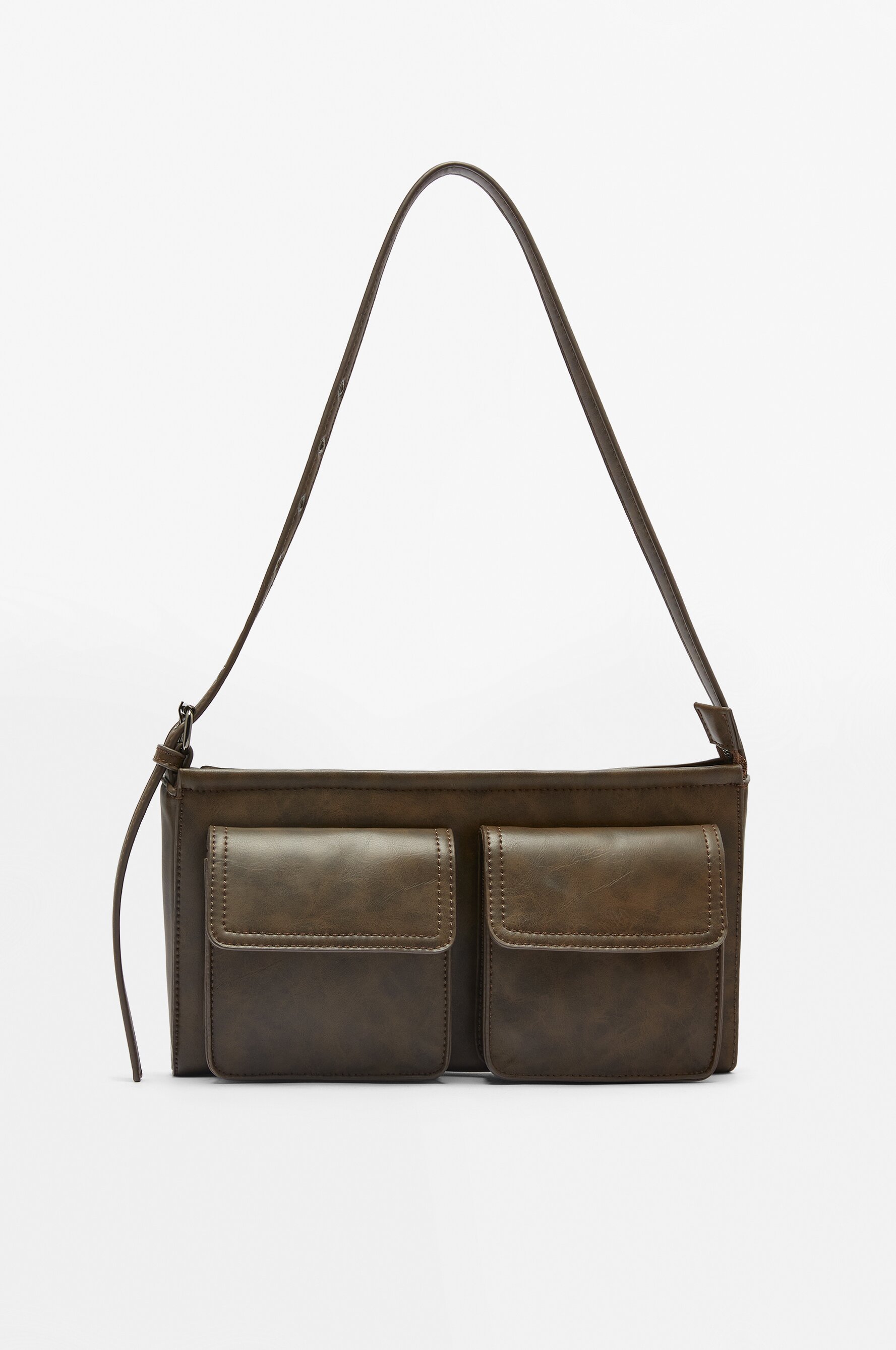 Distressed shoulder bag with pocket