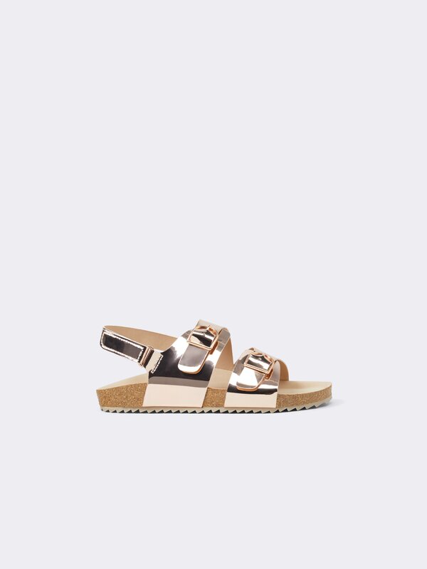 Metallic sandals with buckles