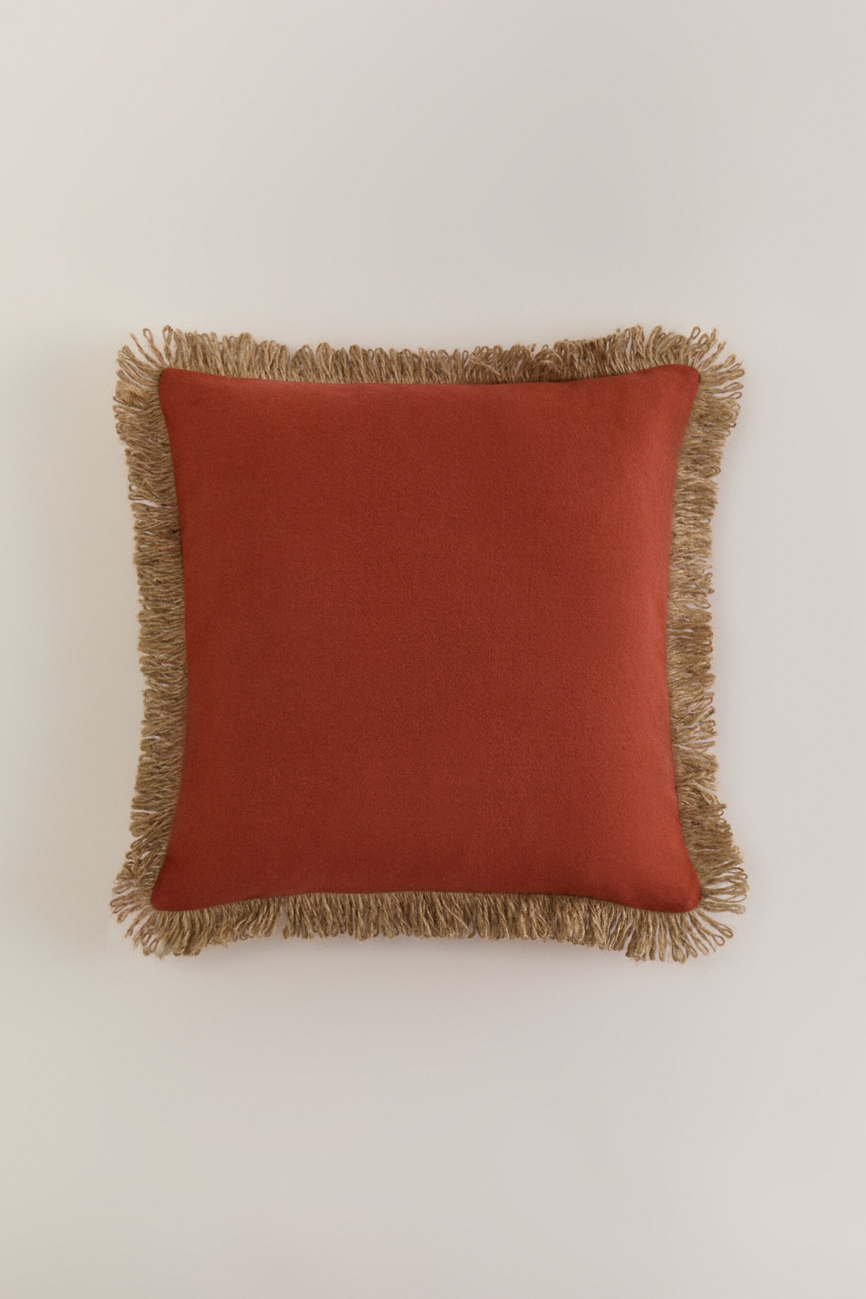 Funda cojín flecos (50 cm. x 50 cm.)