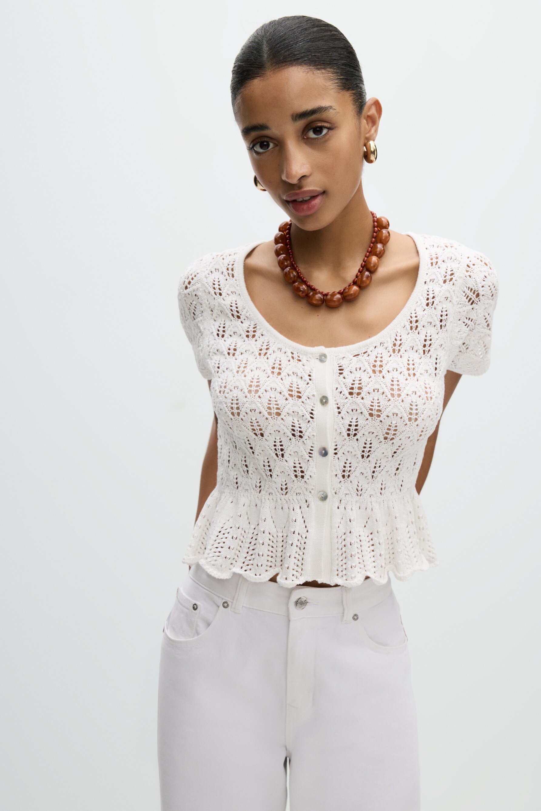 Top volante punto calado