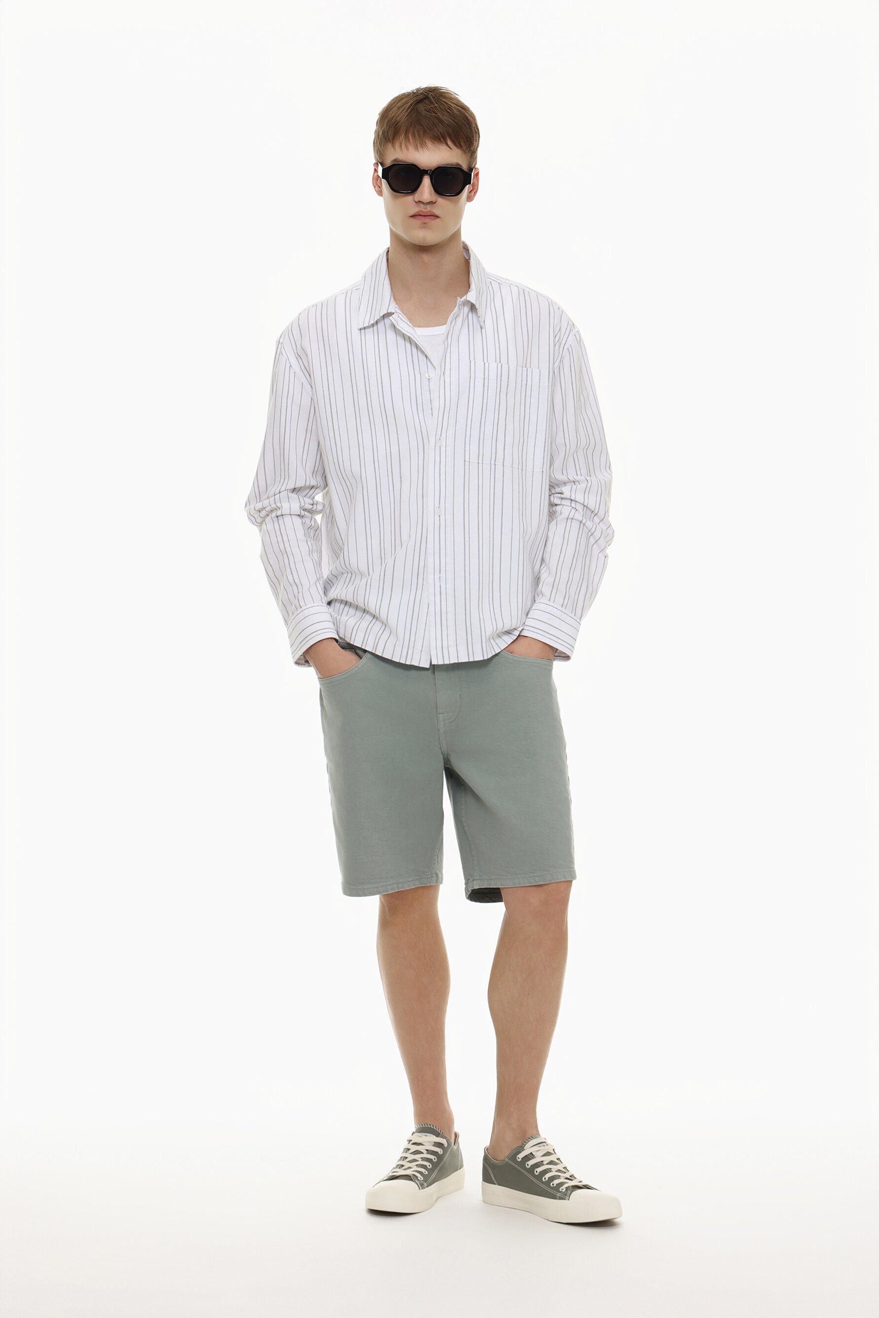 Bermuda denim slim efecto lavado