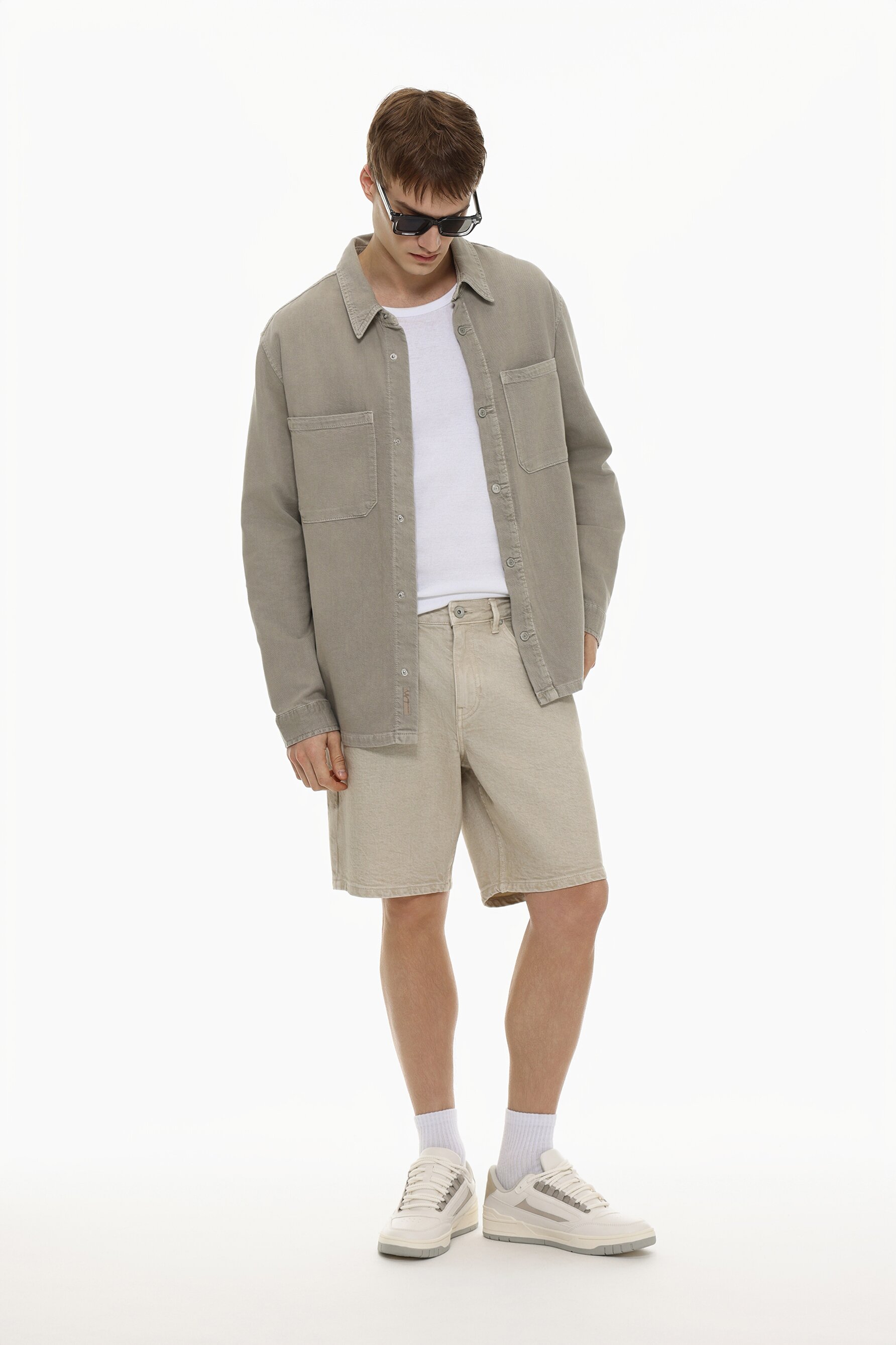 Bermuda denim slim efecto lavado