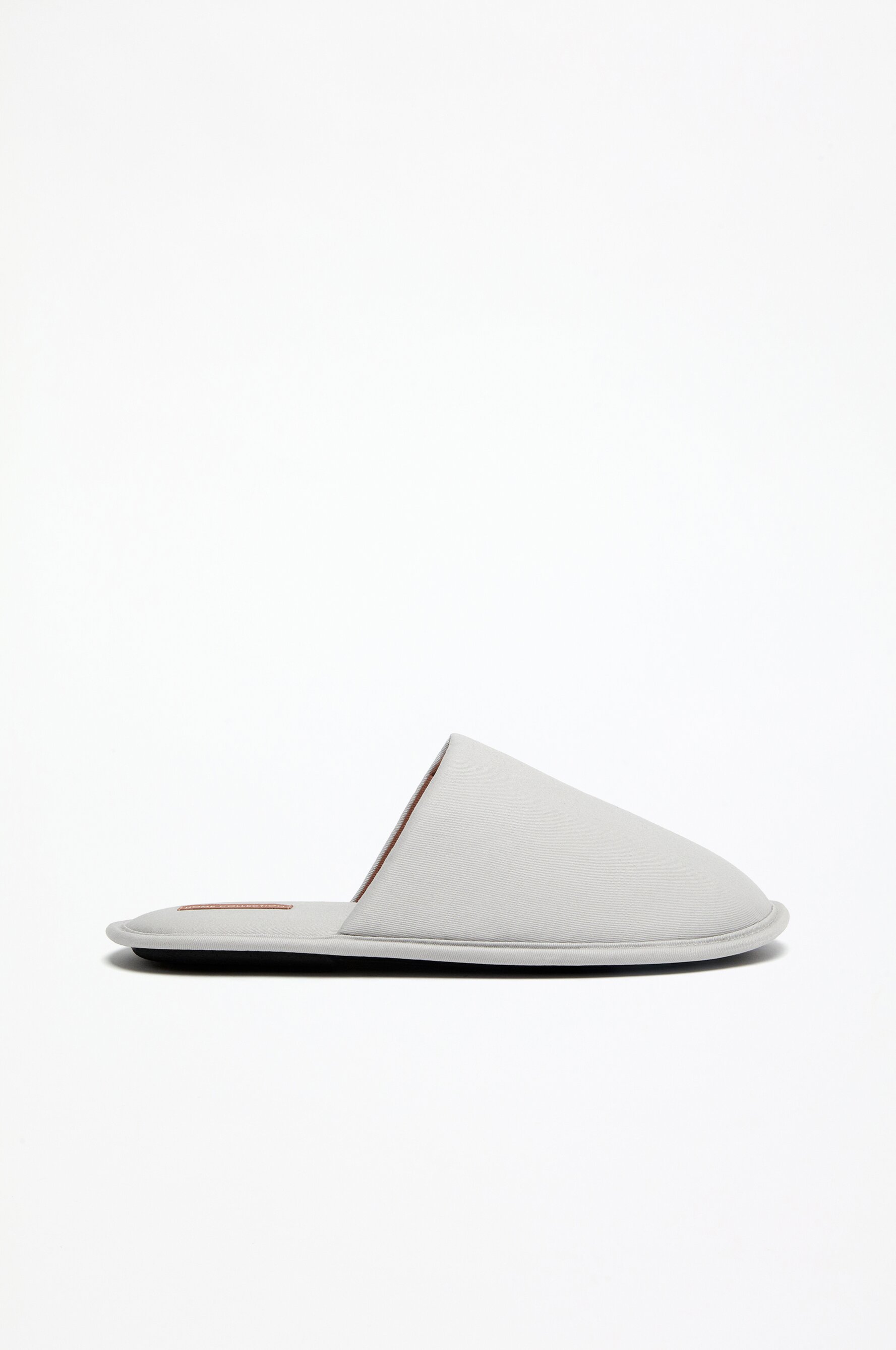 Zapatilla de casa tejido